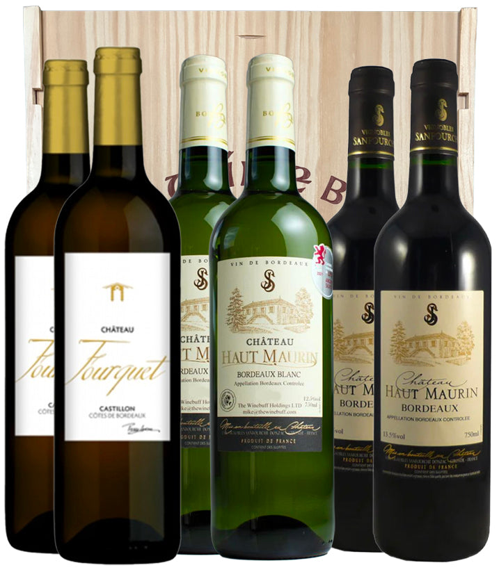 Collection of Château Haut-Maurin wine bottles in a wooden gift box.