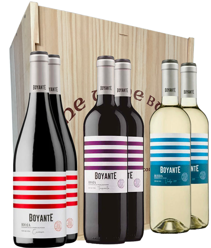 Collection of Boyante wine bottles in a wooden crate on a white background