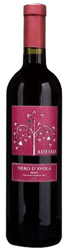 Adesso Nero d'Avola, picture of  wine bottle with red wine made from Nero d'Avola grapes, a red foil capsule on the top of the bottle with a red label with a picture of a tree with love hearts as leaves. From Sicily in Italy.