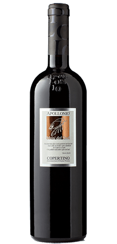 Apollonio Copertino. Bordeaux shaped wine bottle with a black capsule top. With a white label with gold fold square. Text APOLLONIO Mani du Sud & COPERTINO. The wine is from Puglia in southern Italy.