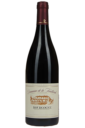 red burgundy wine in a wine bottle with a red top and a white label with a picture of a vineyard