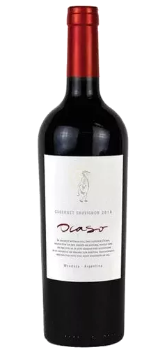Tall wine bottle with red wine made from Cabernet Sauvignon grapes. Red foil on the top of the bottle covering the cork. Long label in white with the text CABERNET SAUVIGNON, OCASO, MENDOZA ARGENTINA.